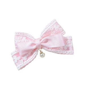 Elegant pink ribbon bow hair clip with white lace trim and a hanging pearl pendant