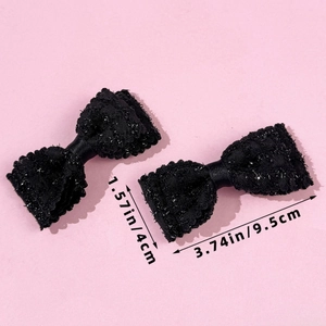 Dettaglio del set di fermagli per capelli a fiocco in pizzo nero glitter con misure