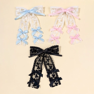Elegant lace bow hair clips with long streamers in blue, pink, and black colors