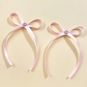 Fermagli per capelli con fiocchi in raso rosa, stelle d'argento e nastri eleganti