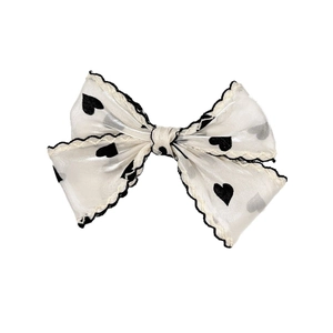 Elegant French style organza hair clip with black heart pattern and wavy edges