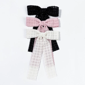 Elegant bow hair clips set in black pink and white with textured fabric and lace trim