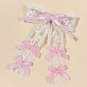Elegant white lace hair clip with pink silk bows and long flowing ribbons for women