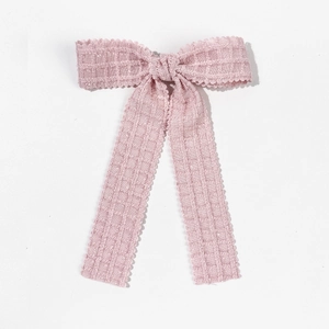 Elegant light pink plaid bow hair clip with scalloped lace edges on a clean white background