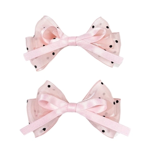 Lot de deux pinces à cheveux à nœuds en résille rose à pois et ruban d'organza