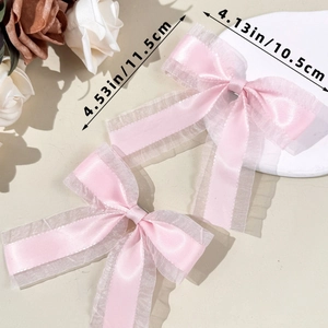 Pince à cheveux nœud en résille rose de 11,5 cm par 10,5 cm pour un style doux