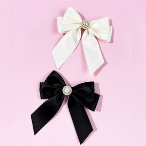 British style bow brooch with rhinestone pearl accent in black and white satin ribbon