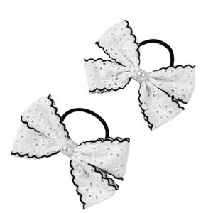Set of two white lace bow hair ties with black contrast trim and faux pearl center