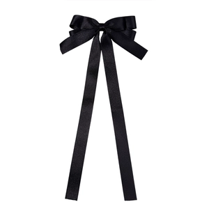 Elegant black satin bow hair clip with long ribbons featuring a silky lustrous finish