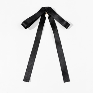 Elegant black bow tie with pearl pendant for women, minimalist vintage style accessory