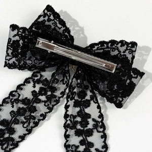 Elegant French black lace bow hair clip with intricate floral patterns and metal duckbill clip