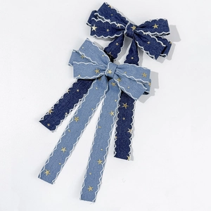 Denim star pattern bow hair clips with white wavy lace edges in light and dark blue