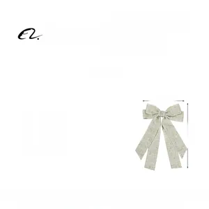 Detail showing dimensions of the elegant fabric bow hair clip with long ribbon tails