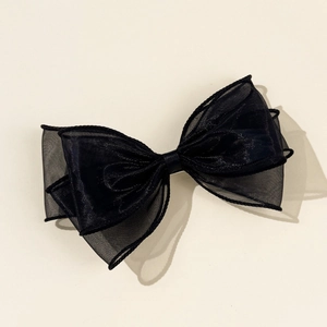 Elegant multi-layered black mesh bow hair clip with sophisticated mesh fabric texture
