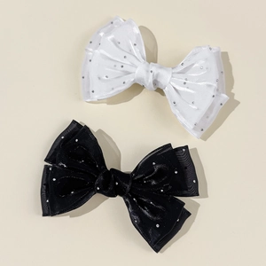 Set di fermagli per capelli a fiocco in rete bianco e nero con strass argentati