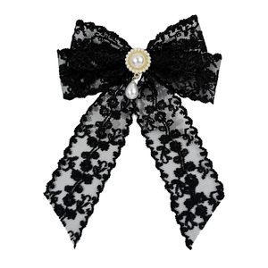 Elegant black lace bow hair clip featuring a large center pearl and water drop pearl pendant