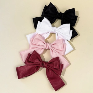 Quatre pinces à cheveux noeud en satin fait main en noir, blanc, rose et bordeaux