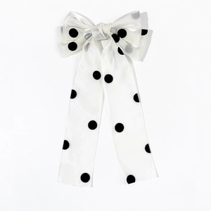 Barrette à cheveux élégante à pois blancs avec longs rubans pour un style vintage