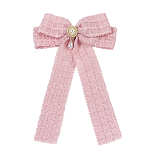 Pink tweed bow hair clip with vintage pearls and elegant lace detailing for women