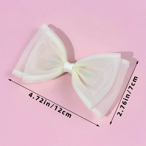 Detailed view of dual-layer white sheer mesh bow clip measuring 12cm by 7cm