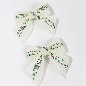 Set di fermagli per capelli con fiocco floreale, pizzo bianco e motivo a fiori blu dolci
