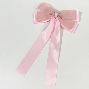 Barrette à cheveux élégante avec nœud en maille rose et rubans longs, accessoire de coiffure
