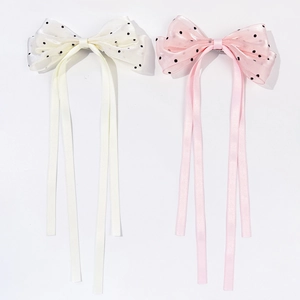 Lot de deux barrettes à nœuds à pois avec longs rubans en couleurs blanc crème et rose pâle
