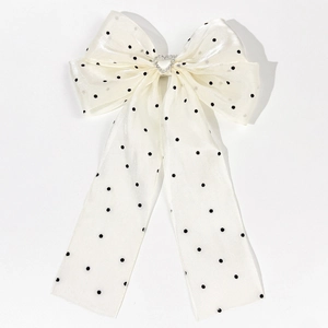 Polka dot mesh bow hair clip with heart rhinestone center in off-white finish
