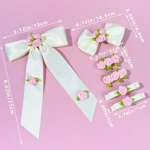 Détails du lot de barrettes fleurs roses avec rubans en satin et mesures précises ici