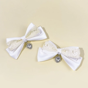 White satin bow hair clips with lace trim and heart-shaped crystal pendant