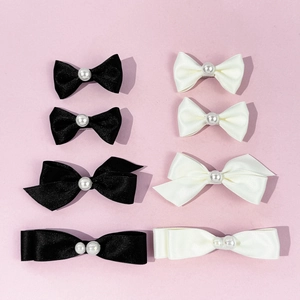 Élégant ensemble de 8 barrettes à nœuds en satin avec perles en noir et blanc crème