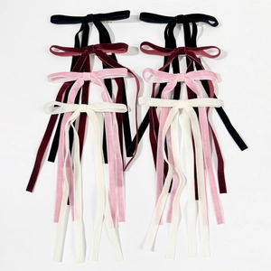 Elegant velvet bow hair clips with long ribbons in black, wine red, pink, and white
