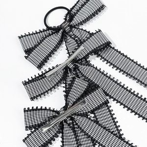 Japanese style black and white plaid bow hair clip set with lace edges and handmade label