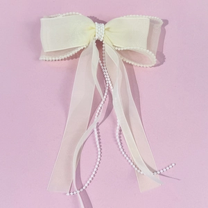 Barrette nœud en tulle élégante avec perles et longs rubans en finition blanc crème