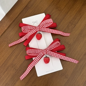 Sweet red gingham strawberry bow hair clips set for girls on a white display card