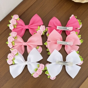Set of floral bow hair clips with silk roses and metal duckbill clips for girls