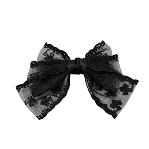 Elegant large black lace bow hair clip with intricate embroidery and vintage style