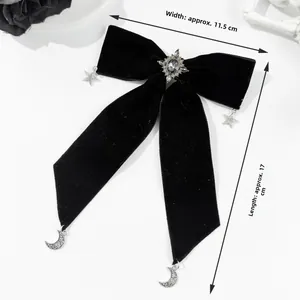 Gothic black velvet bow hair clip with star and moon charms, dimensions 11.5cm by 17cm