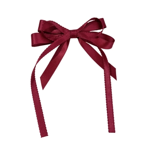 Elegant wine red satin ribbon bow hair clip with decorative jagged lace edges