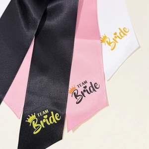 Elegant satin bridal sashes in black pink and white with Bride and Team Bride text