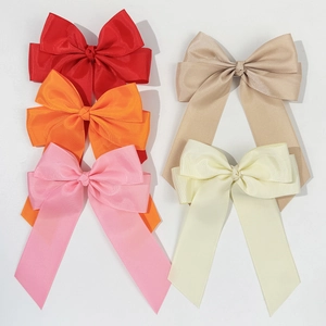 Set di cinque eleganti fermagli per capelli con fiocchi in nastro grosgrain colorati