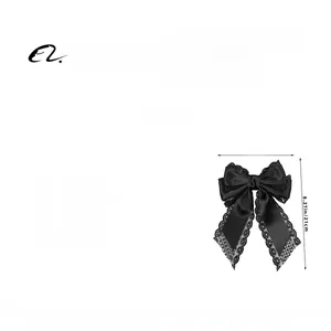 Detail of black lace bow hair clip with dimensions 15cm width and 21cm height