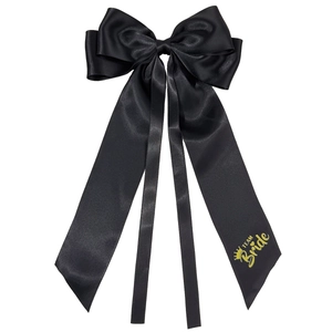 Elegant black satin bow hair clip with gold Team Bride text for wedding parties