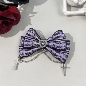 Gothic lace bow hairclip with heart jewel, cross chains and dark lolita aesthetics detail