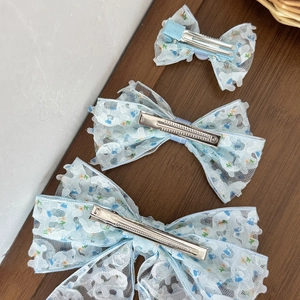 Lot de trois barrettes à nœuds en dentelle florale bleu clair de tailles différentes