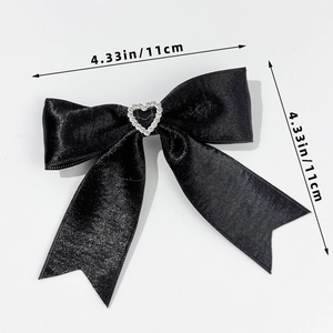 Detailed dimensions of 4.33 inch black satin bow hair clip with crystal heart detail