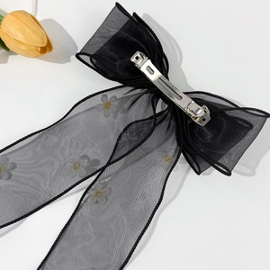 Pince à cheveux élégante en tulle noir avec de longs rubans et un clip à ressort
