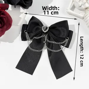 Gothic black satin bow clip with silver chains, cross charm, and size 11x12cm