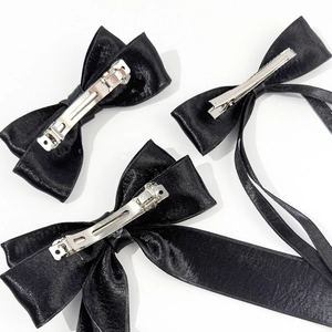 Elegant French black satin bow hair clips set with long ribbons and metal spring clips