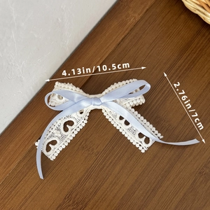 Lace heart bow hair clip measurement details with blue ribbon and size annotations